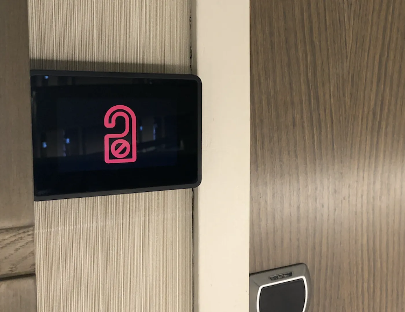 Exterior GridRabbit DnD and Make Up Room touch screen installed outside the room