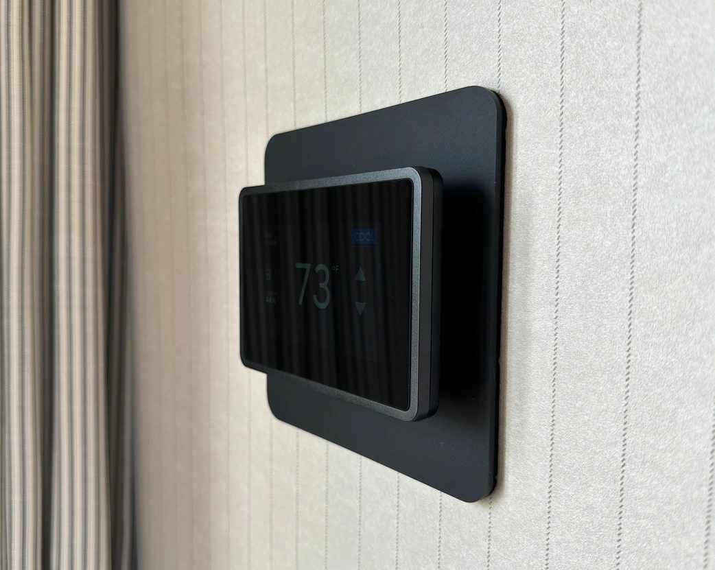 All-black GridRabbit thermostat with all-black custom beauty plate
