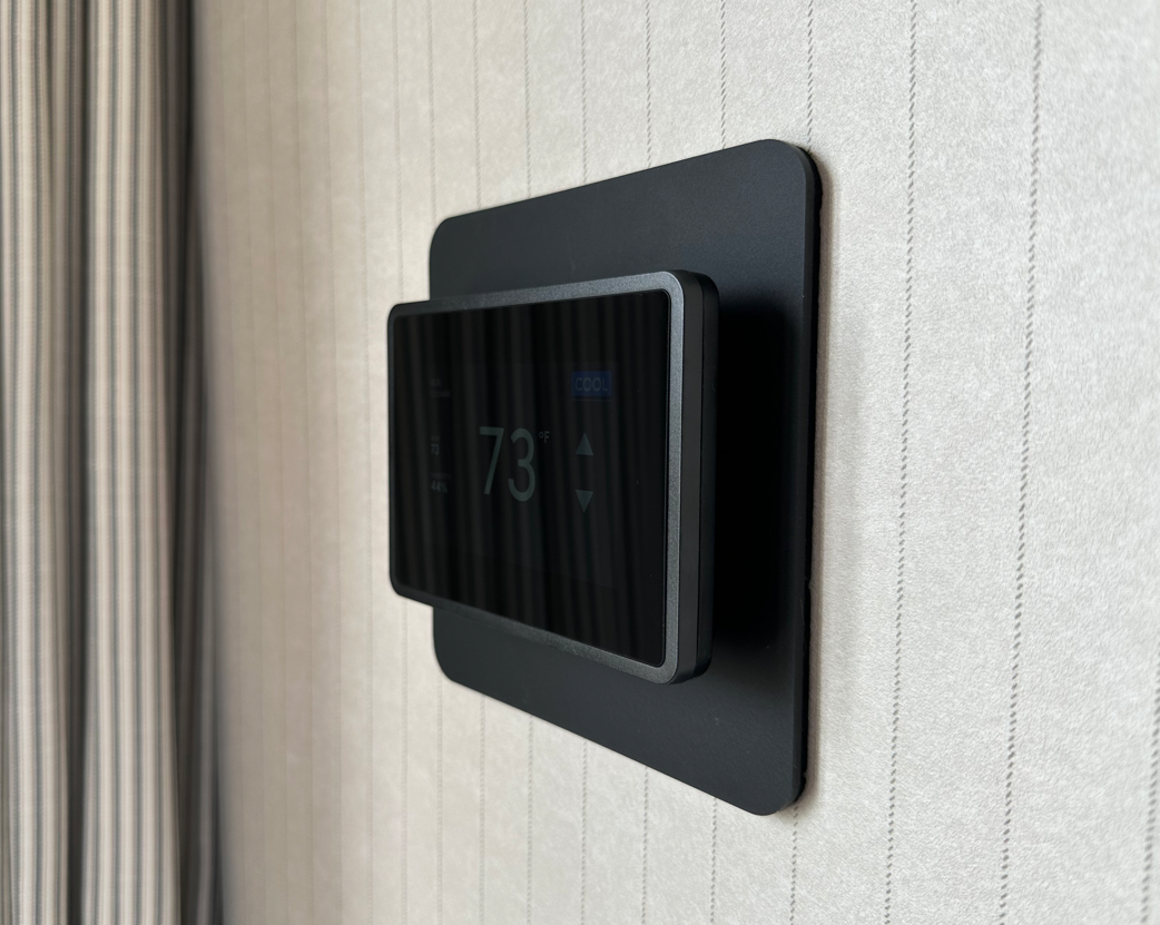 All-black GridRabbit thermostat with all-black custom beauty plate